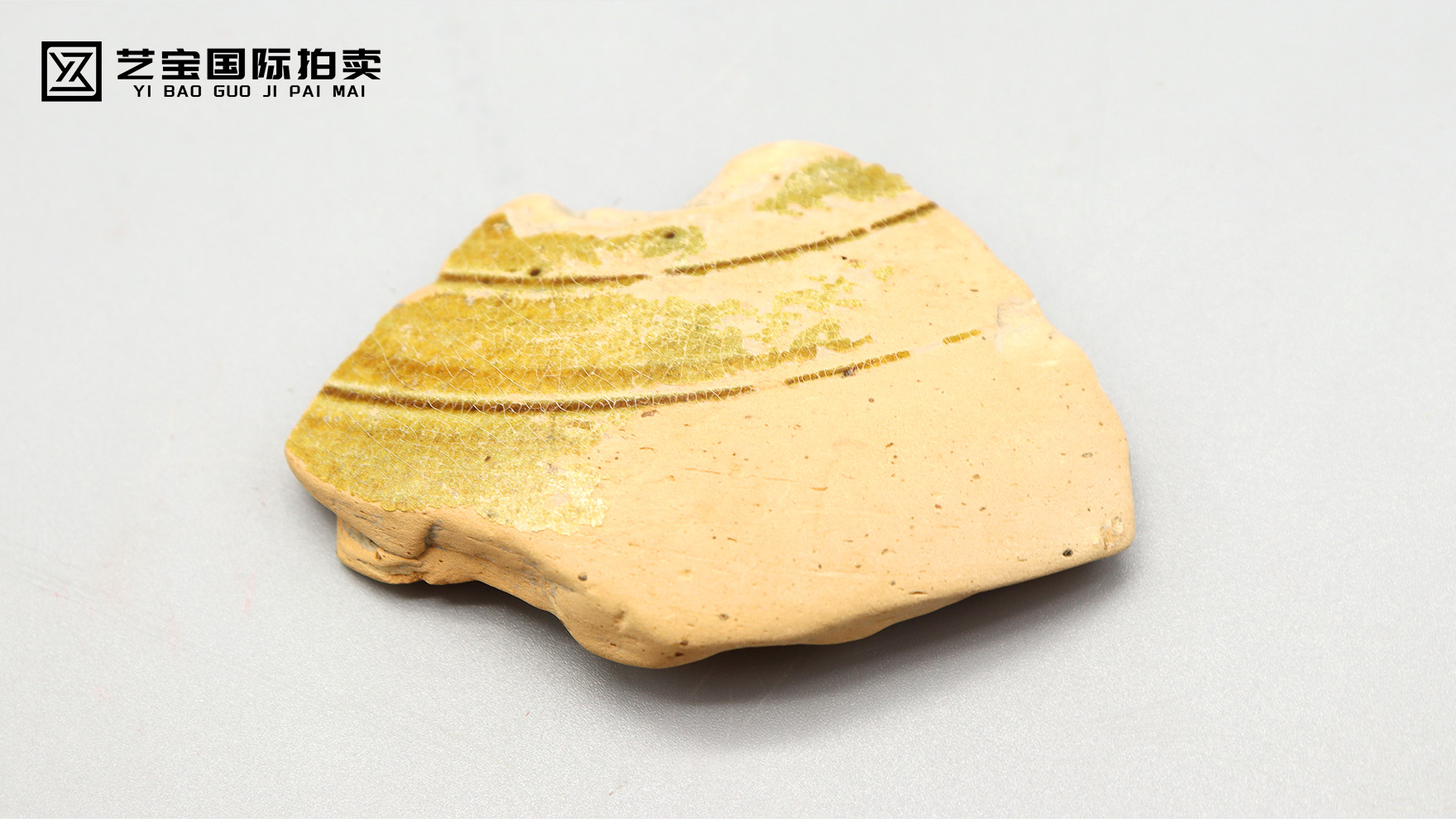 战国釉下褐彩原始瓷残片：触摸千年窑火，对话古早文明