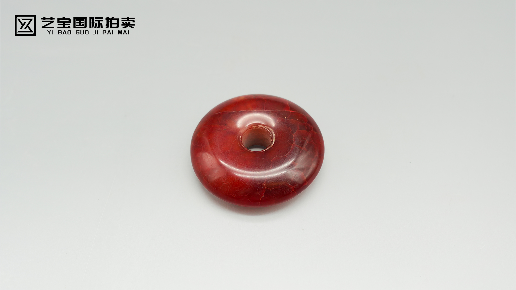 凝一抹丹红，守一世平安——鸡血石平安扣